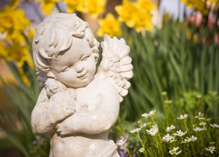 a photo of a garden angel