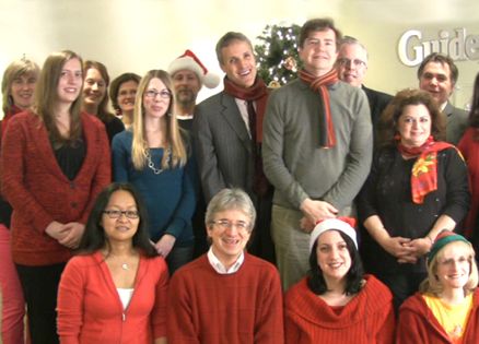 Guideposts staffers singing Hark! The Herald Angels Sing