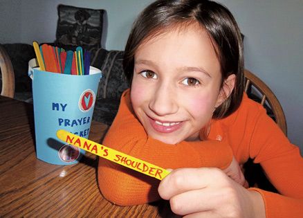 Lorraine's daughter, Hannah,with her prayer bucket