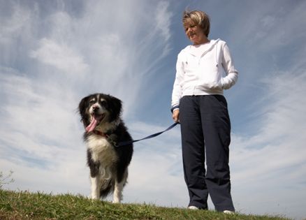 A woman gazes at her dog