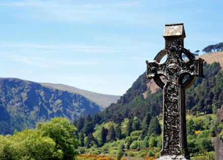 An Irish highcross and a beautiful landscape at Glendalough, County Wicklow