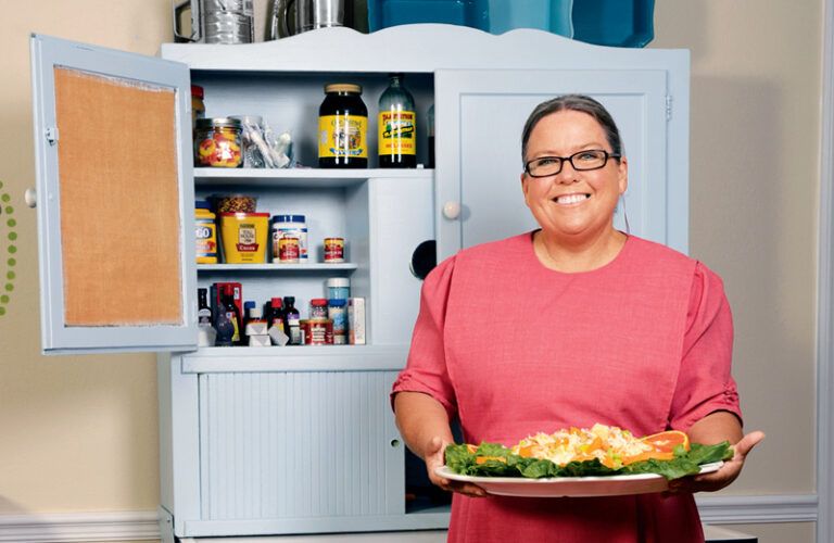 Sherry Gore with a platter of her tropical chicken salad