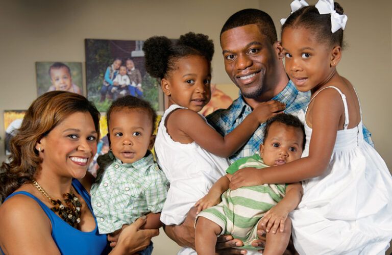 Benjamin Watson, his wife, Kirsten, and their four children