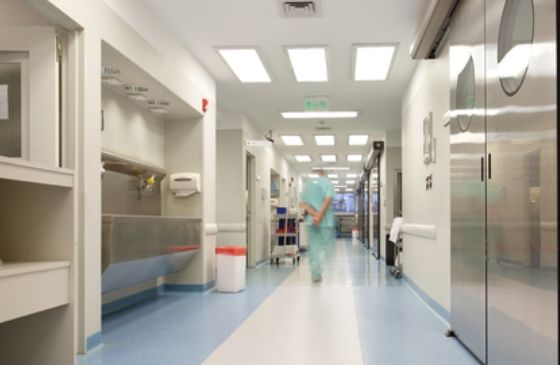 a physician in a hosptial corridor