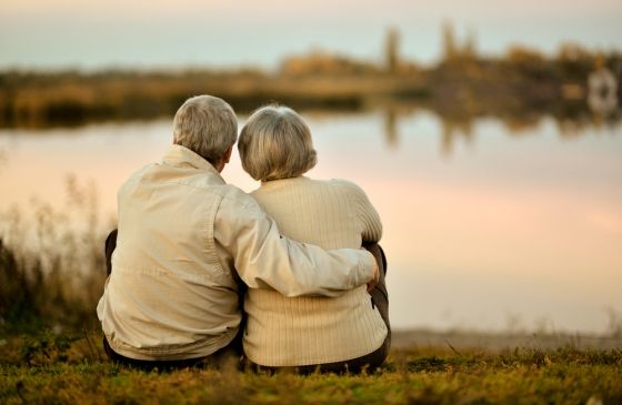 Older couple watching the sunset