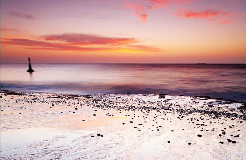 A beach at sunset