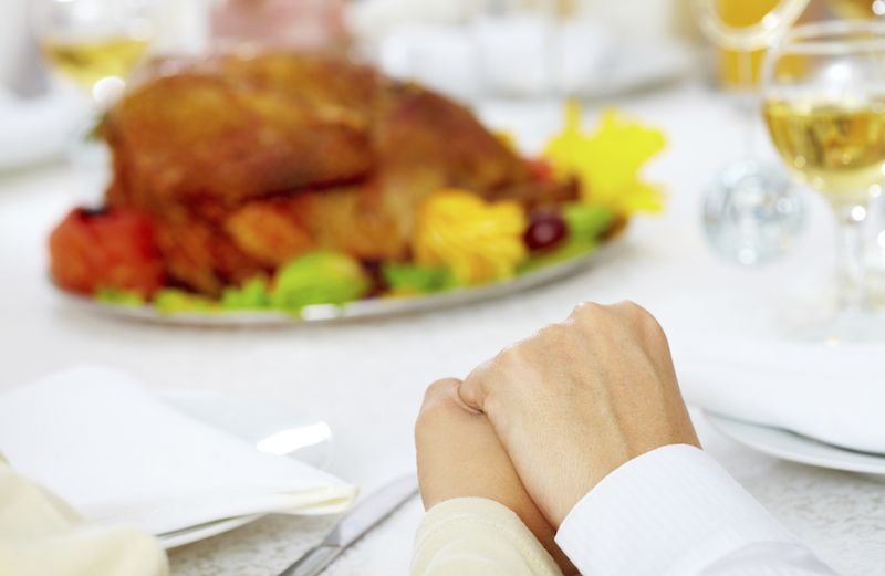 Never let anyone be alone on Thanksgiving. Photo Shironosov for Thinkstock.