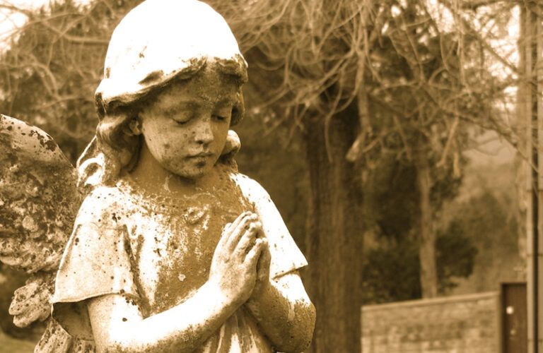 Where are your favorite places to pray? Here a cemetery angel prays.