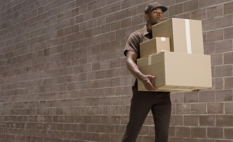 A UPS man makes his delivery