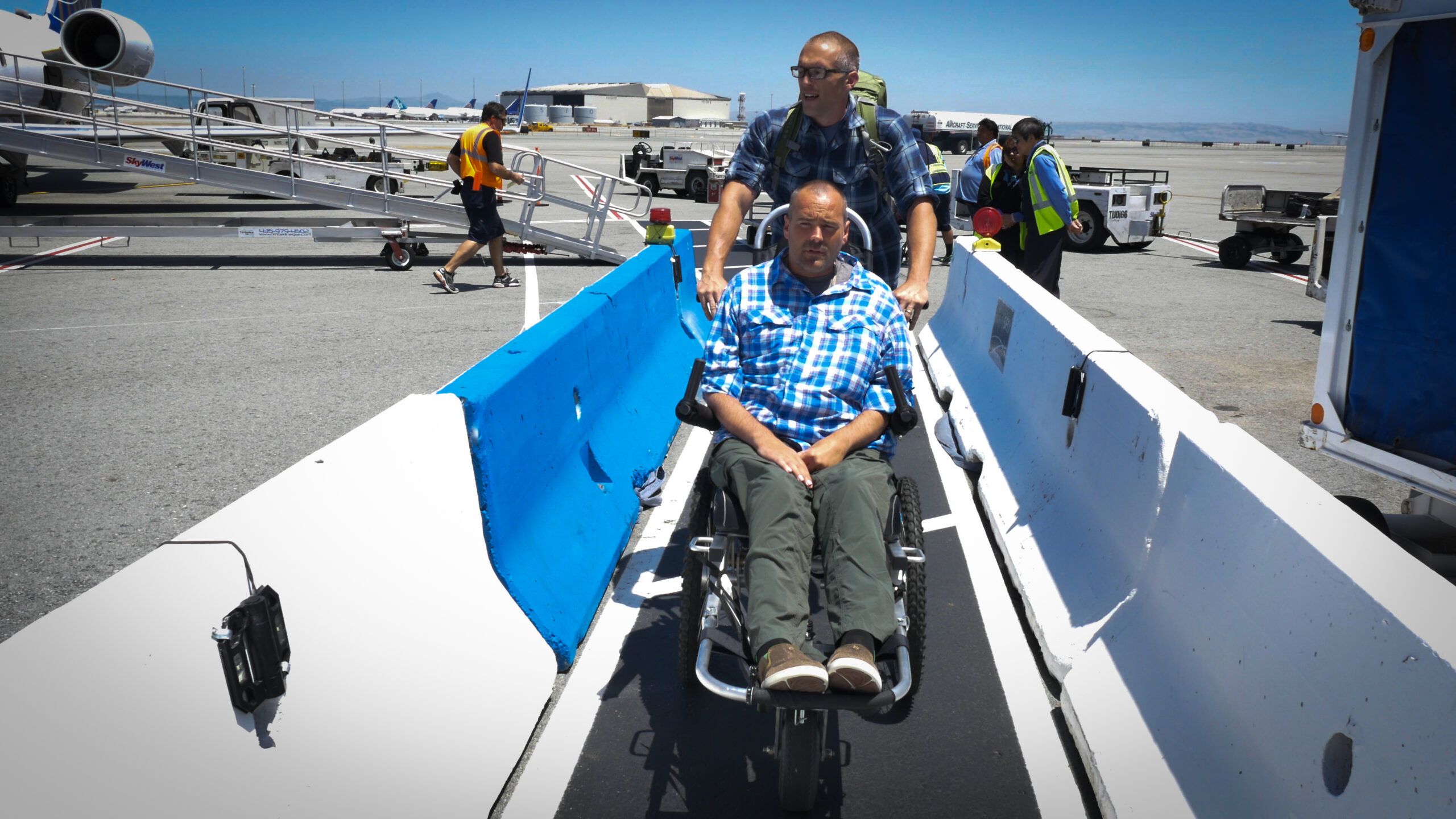 Justin and Patrick exiting the plane in San Francisco