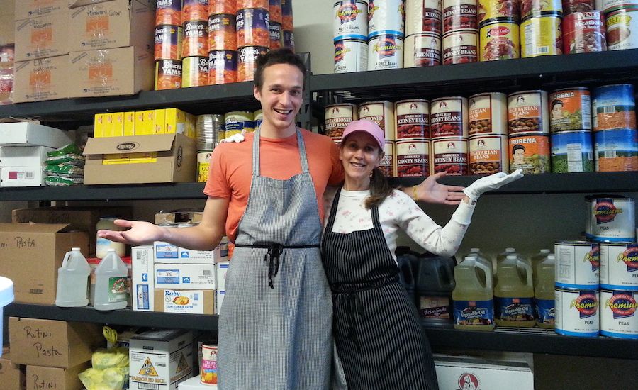 Rick's son Timothy and a soup kitchen volunteer.