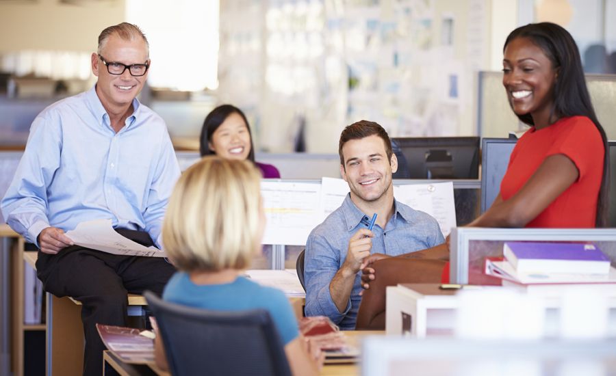 An ethnically diverse group of workers in an office setting