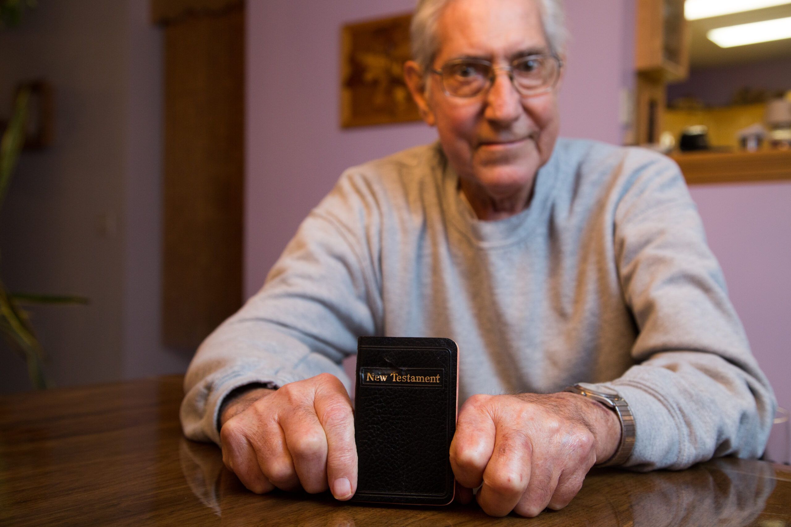 Jack Fulk Displays the Bible That Saved His Life