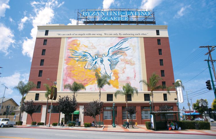 A Los Angeles mural depicting a pair of angels flying together