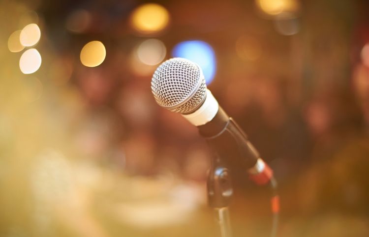 A microphone in a church choir audition