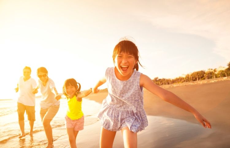 Prayers shape our children's future: family on the beach