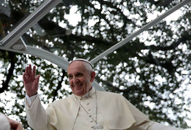 Pope Francis waving