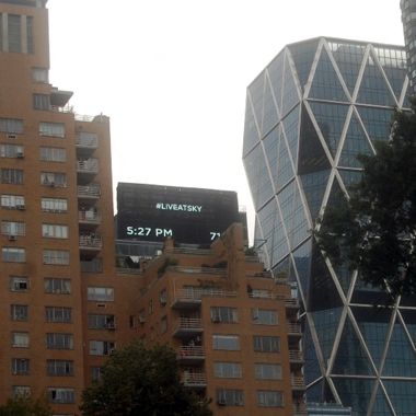 Guideposts: clock over Central Park, where people waited for Pope Francis