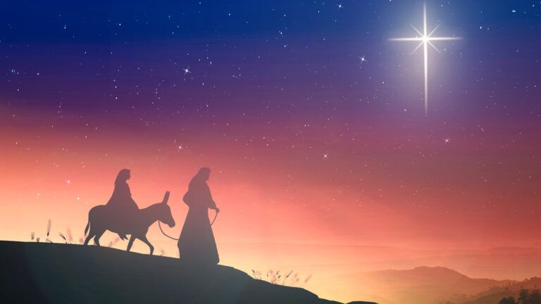 Silhouette of Mary and Joseph and the North Star in the Christmas Bible story