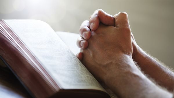 Studies explore the power of prayer and faith in helping others.