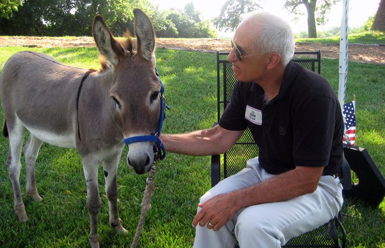 John Folsom and Smoke at the Take Flight Farms fundraiser at Bar Hills Farm in 2011