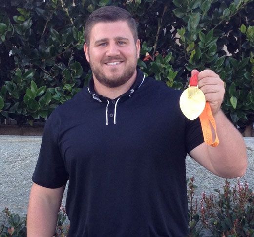 Joe displays his gold medal at the 15th IAAF World Athletics Championships.