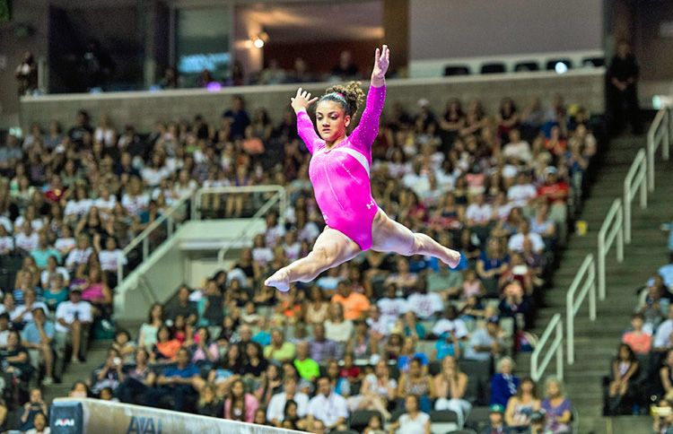 Laurie Hernandez competes for the US Women's gymnastics team