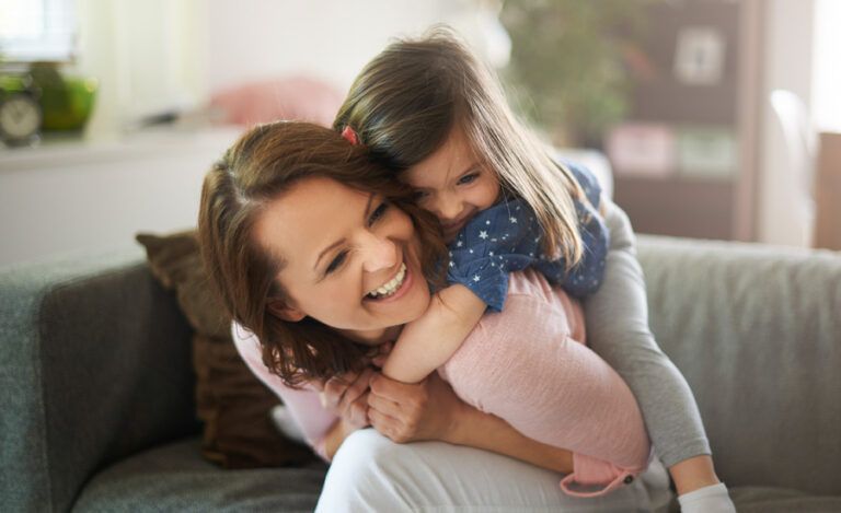 Mother and Daughter Playing