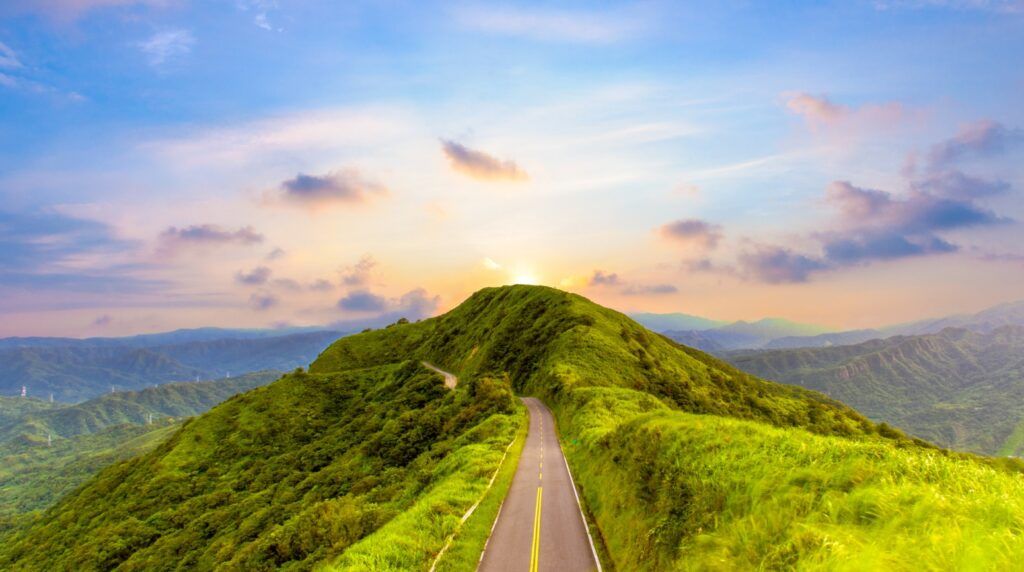 A road in the countryside with a happy New Year prayer