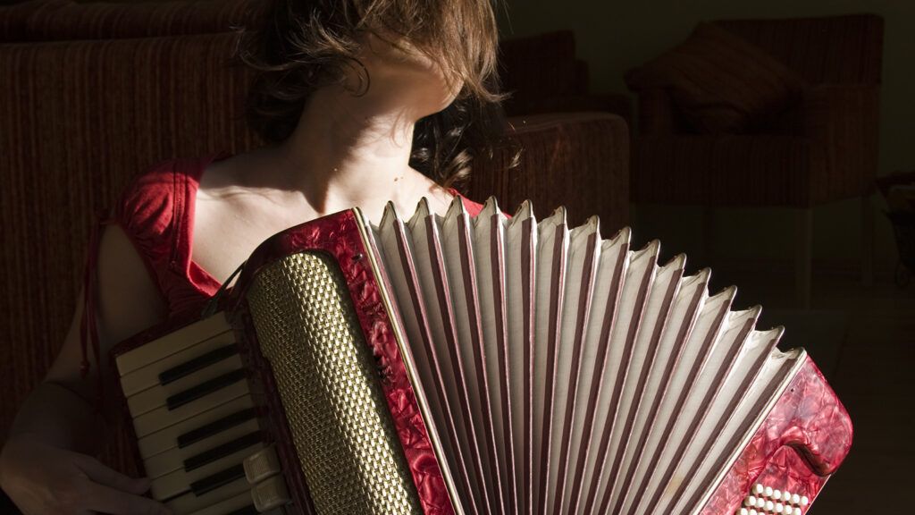 Girl Playing Accordian