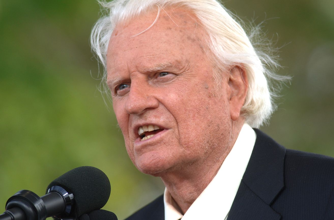 Graham speaks on stage in the borough of Queens, New York, on the third and last day of his farewell American revival on Sunday, June 26, 2005.