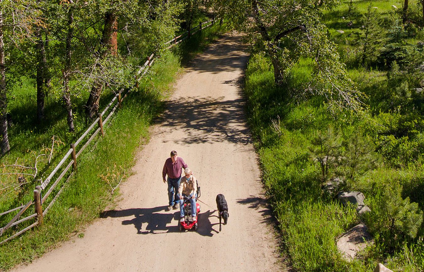 Linda Rae, Don and Trixie stroll a country lane