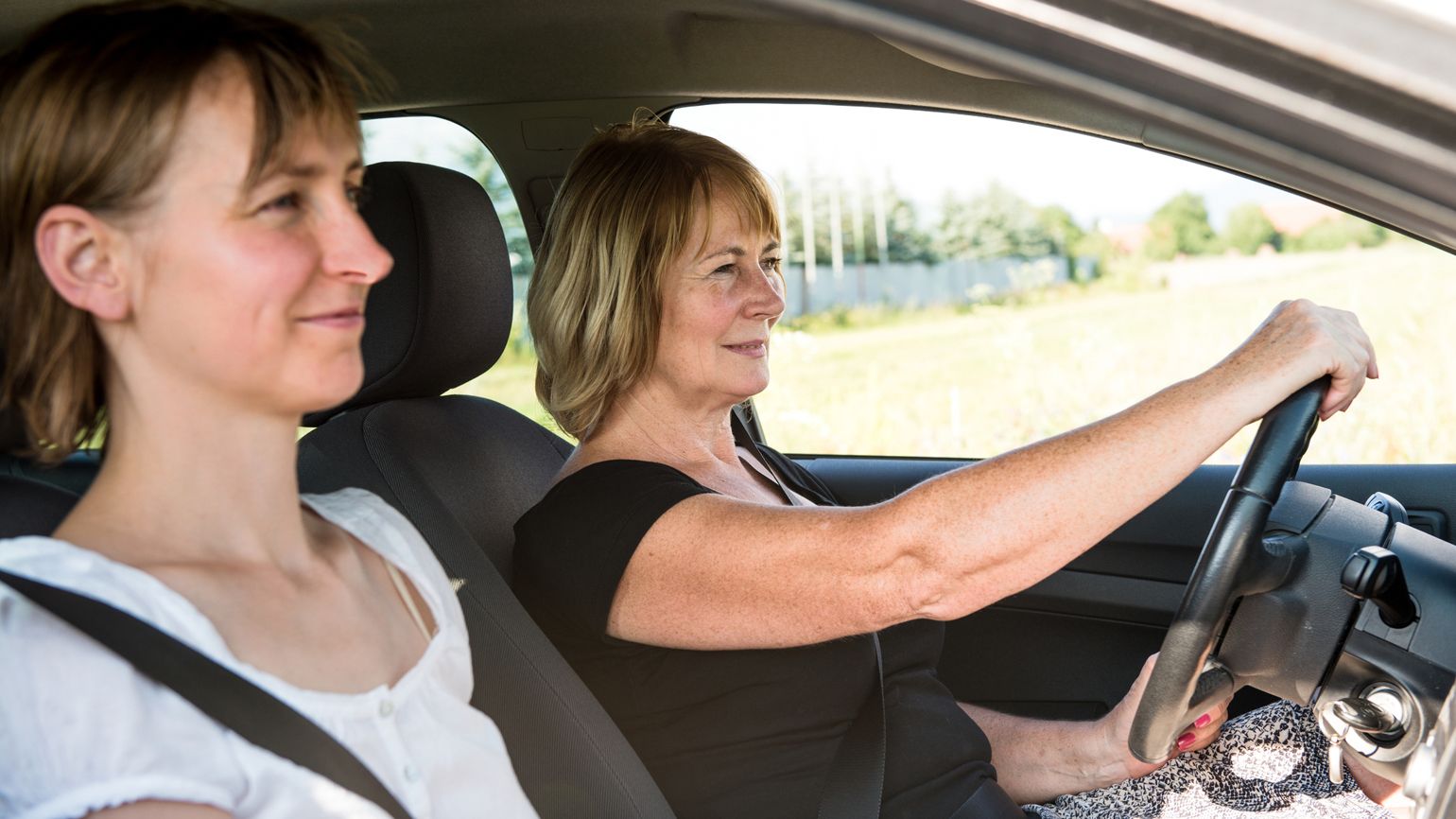 Spiritual Dream Symbols: Cars Senior woman driving with daughter. inspiration miracles