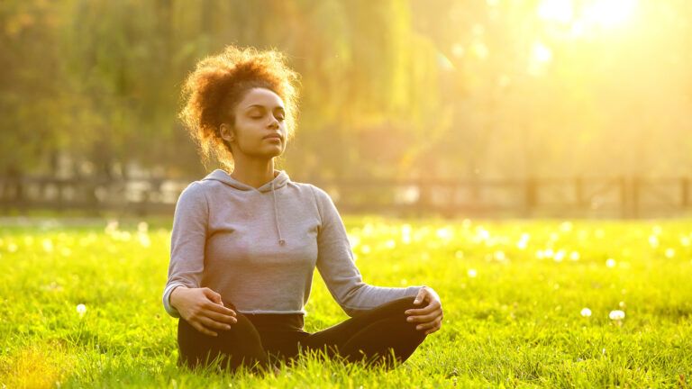 Woman taking a deep breath to calm down