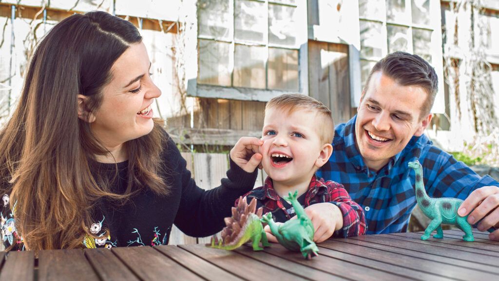 Kate at home with her husband, Toban, and their son Zach.