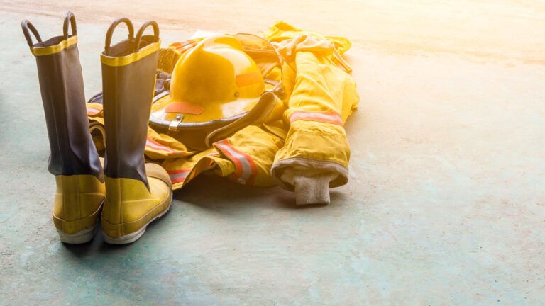 Yellow firemen boots, jacket and helmet.