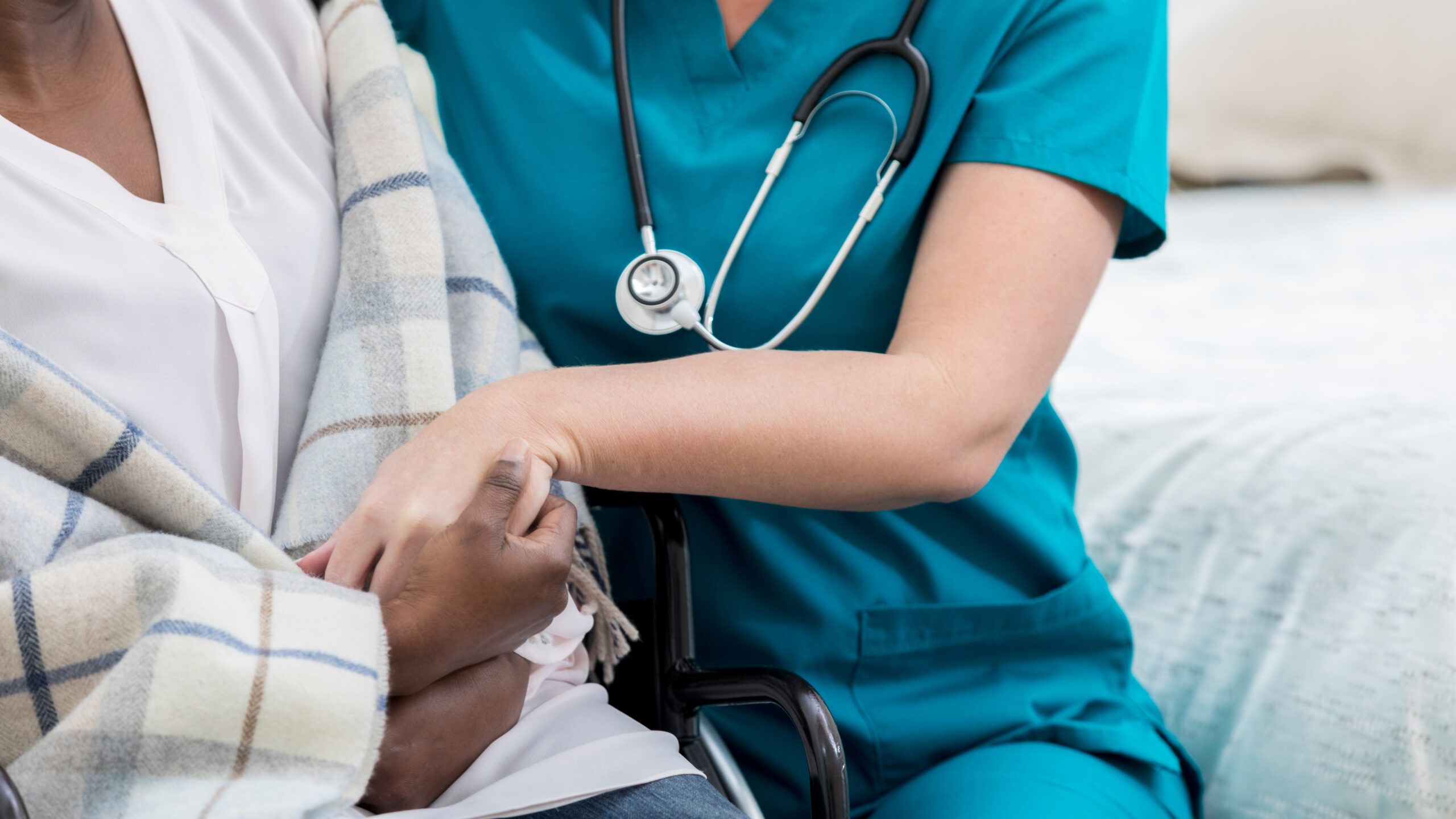 Patient and nurse in hospital