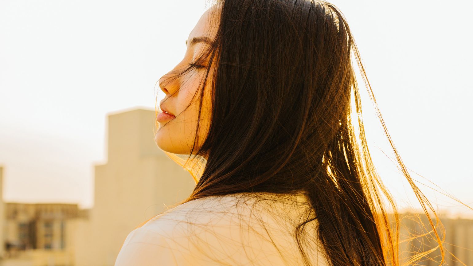 A photo of a woman with a serene, calm expression.