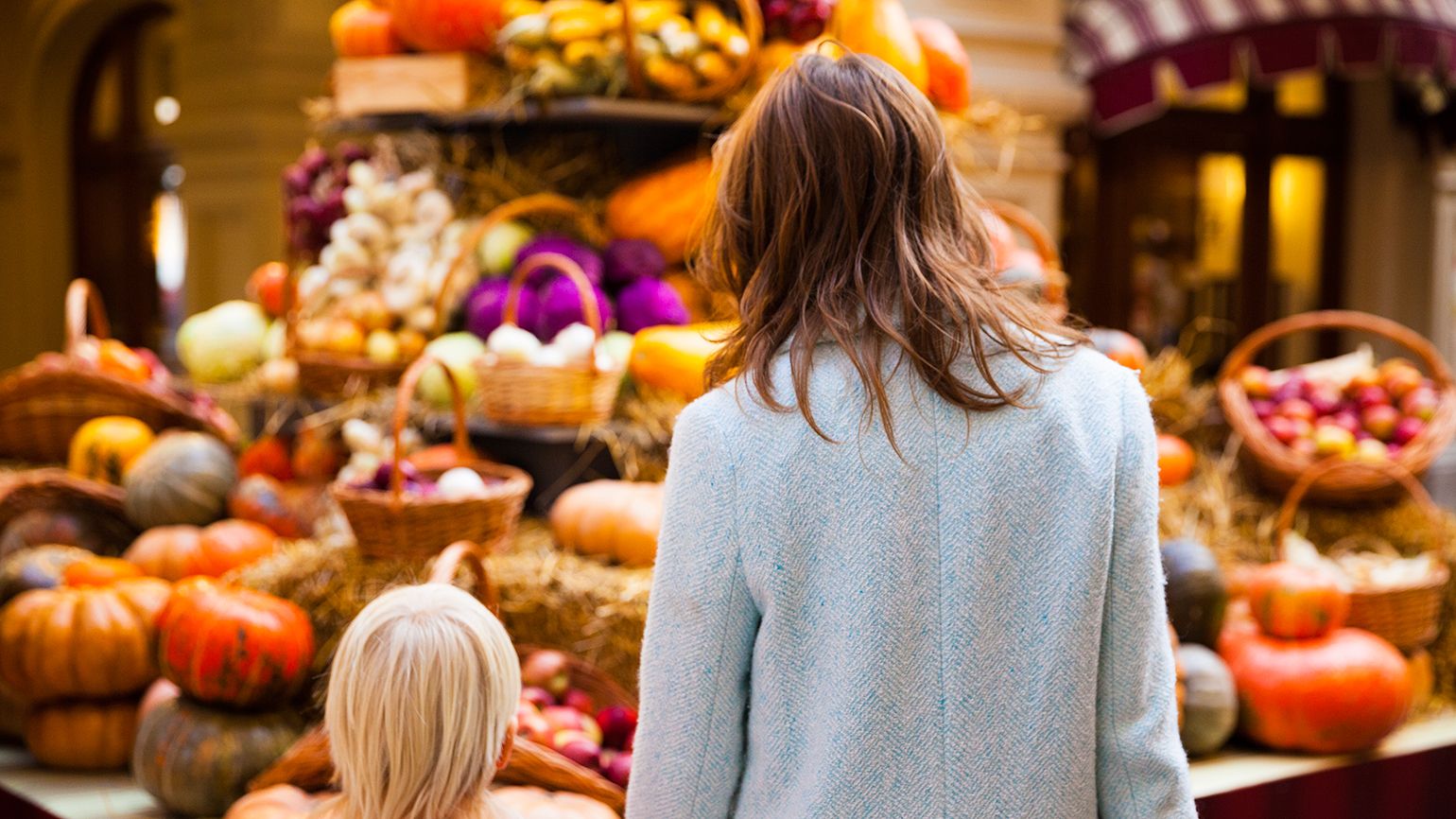 A mother and child at a farmer's market