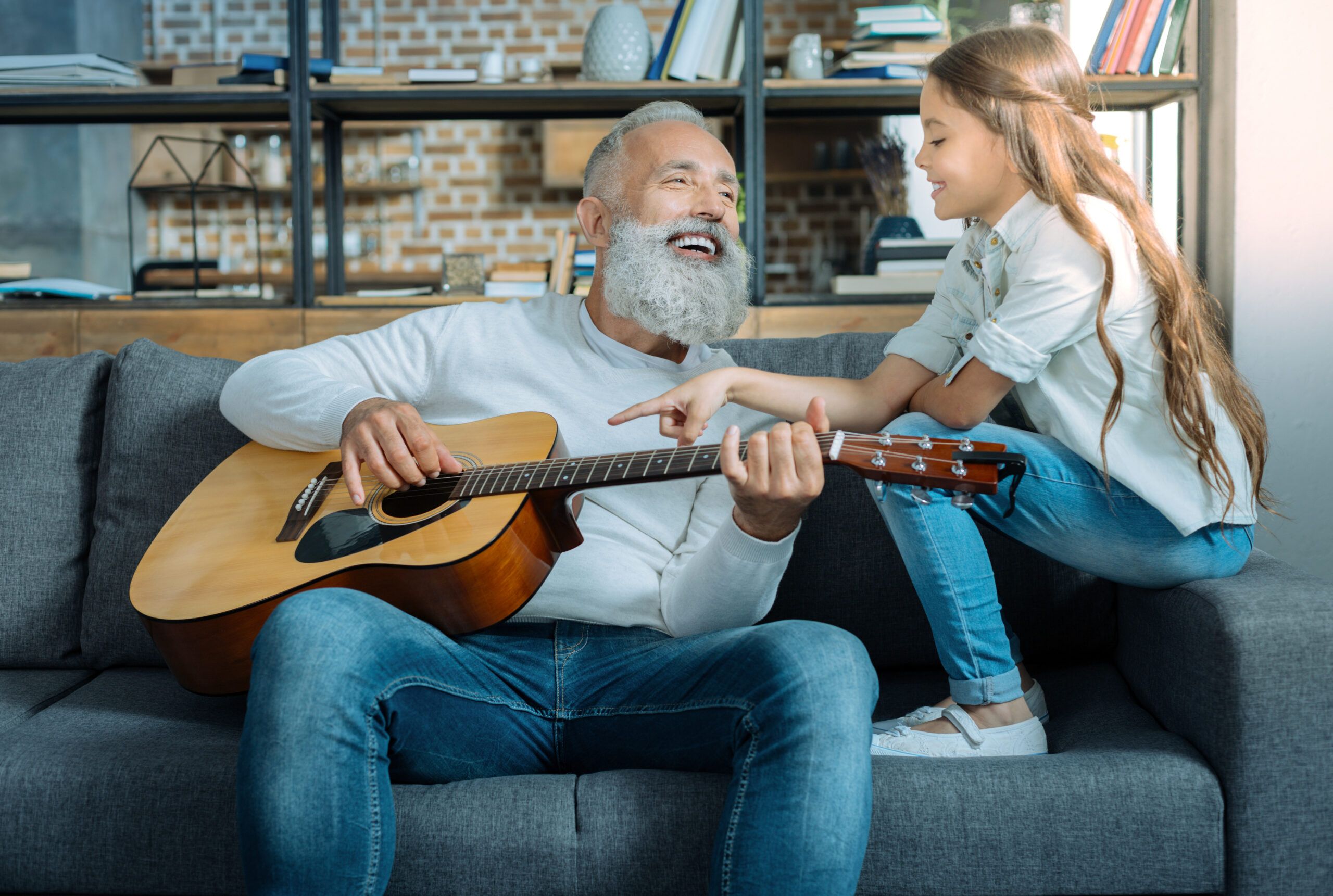 Old man playing guitar