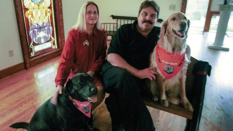 Stephen, Gwen and their pups in the Dog Chapel.