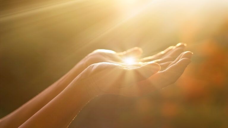 Sunlight on open hands