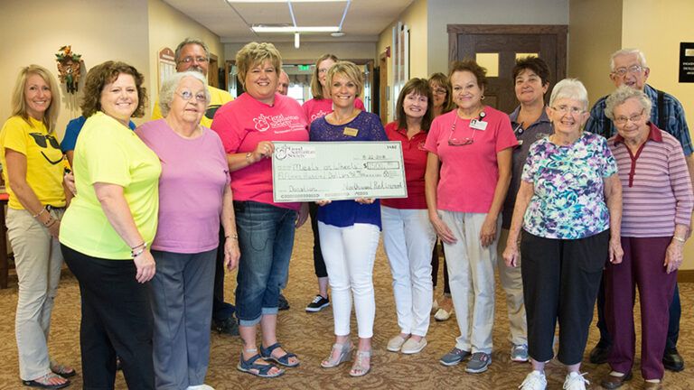 Stacy Kahri, Director of Operations for Generations, accepts a check from Northwood Retirement Community Office Manager Jennifer Wilson and administrator Diane Jones. The money, a grant from the Good Samaritan Society, will help fund the Meals on Wheels.