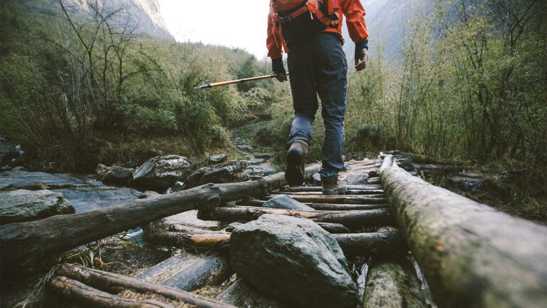 A hiker on a steep trail