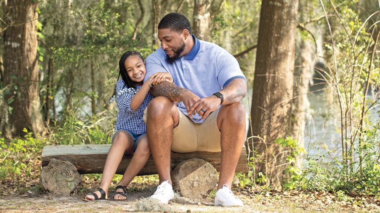 Devon with his daughter, Leah, near his Houston home