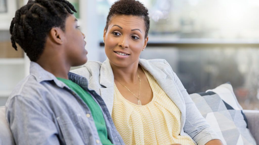 Mom and her teen son talking about their goals for the Lent season