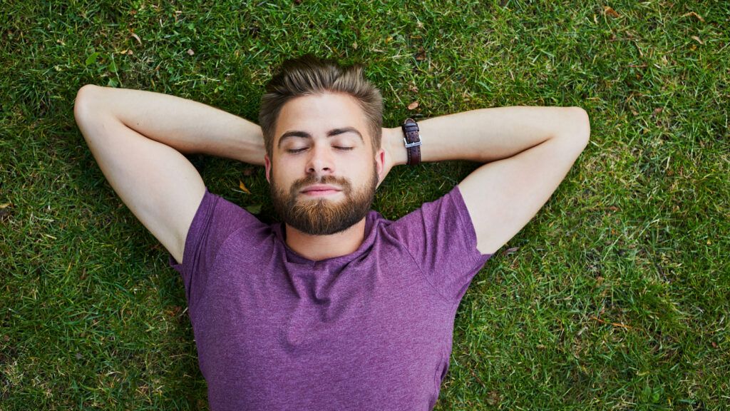 Young man relaxing outdoors