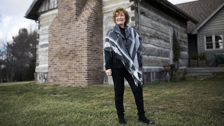 Ginny Curry's old fashioned log cabin decorated for Christmas in Lancaster, OH on January 8, 2018. Curry's husband Bill began to build the cabin and then fell ill and passed away. With the help of friends, they completed the authentic log cabin.