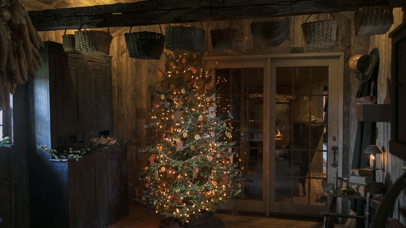 Ginny Curry's old fashioned log cabin decorated for Christmas in Lancaster, OH on January 8, 2018. Curry's husband Bill began to build the cabin and then fell ill and passed away. With the help of friends, they completed the authentic log cabin.