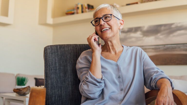 Woman smiling while on the phone